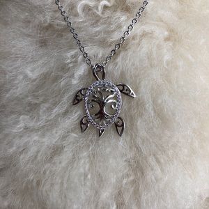 Silver ornate turtle necklace